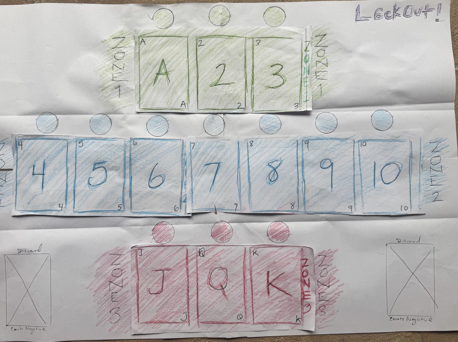 The original hand-drawn Lockout! prototype in colored pencil on taped-together paper